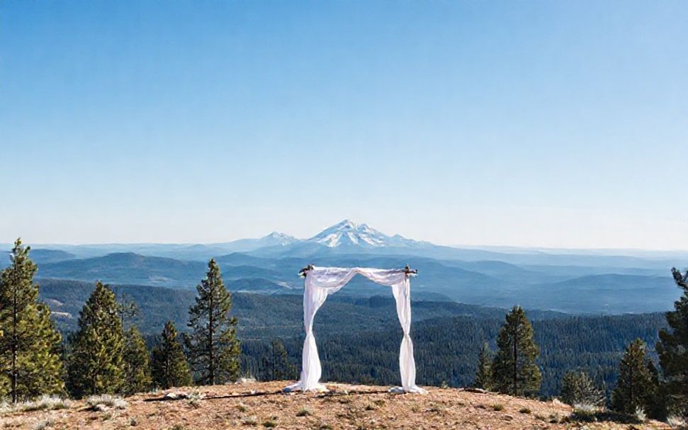 Scenic mountain overlook ceremony location with panoramic peaks view